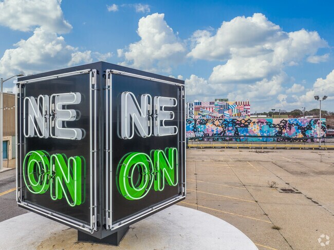 The Neon District in Ghent Square is known for their colorful murals along many retail spaces.