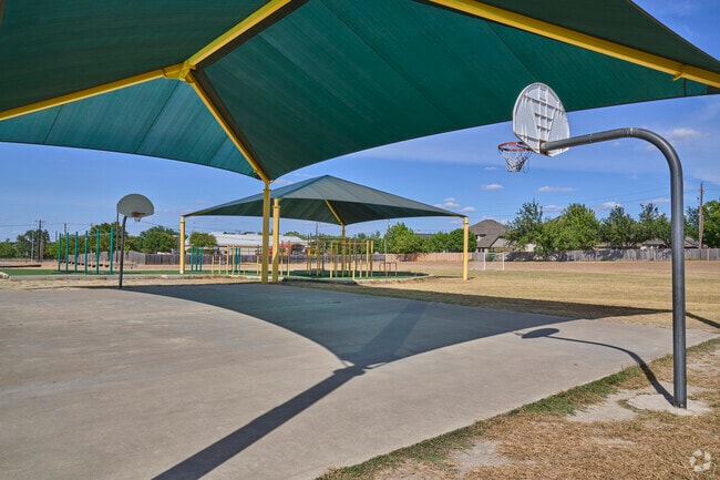 Covered basketball courts are fun and safe for the kids at Murchison Elementary School.