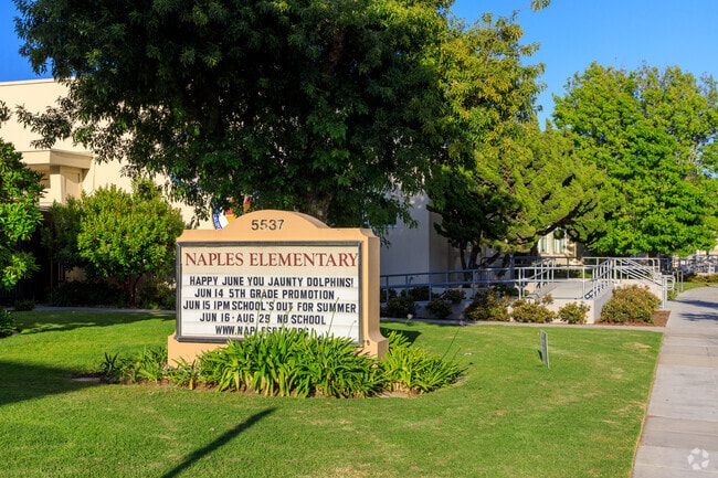 A sign greets you at Naples Bayside Academy, home of the Dolphins in Naples, CA.