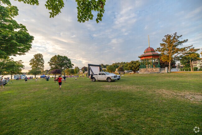 Residents gather for The Movies by the Lake, a weekly gathering in the summer in at Lake Quannapowitt in Wakefield, MA.