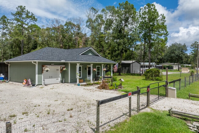Clear out the pines and make your perfect yard in Flagler Estates.