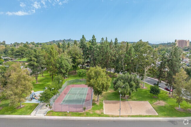 Residents can enjoy the tennis courts and sand volleyball at San Remo Park in North Laguna Hills