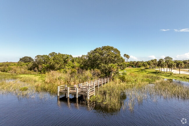 A husband and wife couple take in the views dockside on Lake Washington