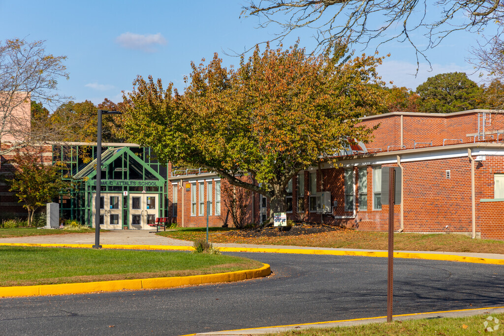 Emma C. Attales Middle School is set in a suburban environment.