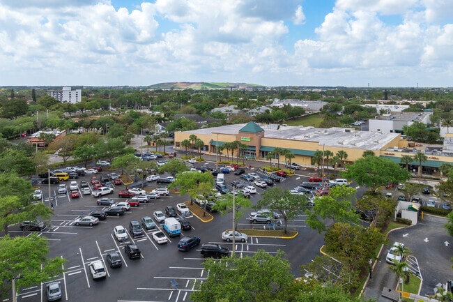 Explore Palm Trees Plaza near Highland Meadows for shopping and dining convenience.