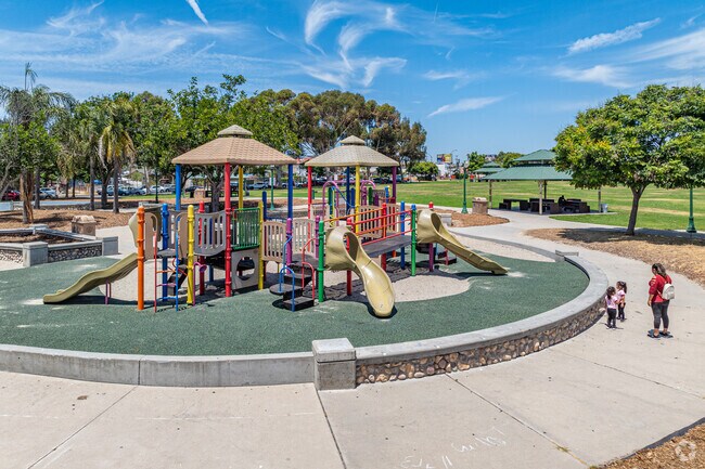 Teralta Park features play equipment for families to enjoy.