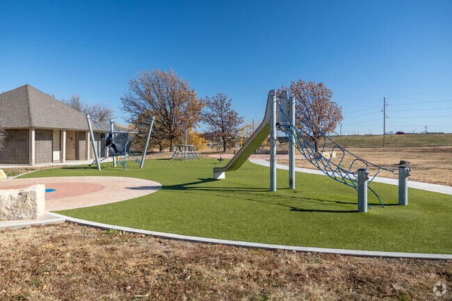 Kids can climb on the playground at Planeview United Park.