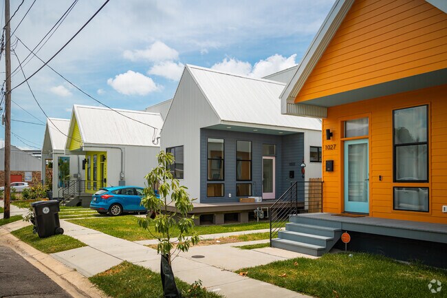 A row of modern Camelbacks line the street in McDonough.
