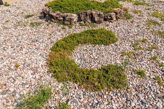 Landscaping displays school spirit at Century Elementary.