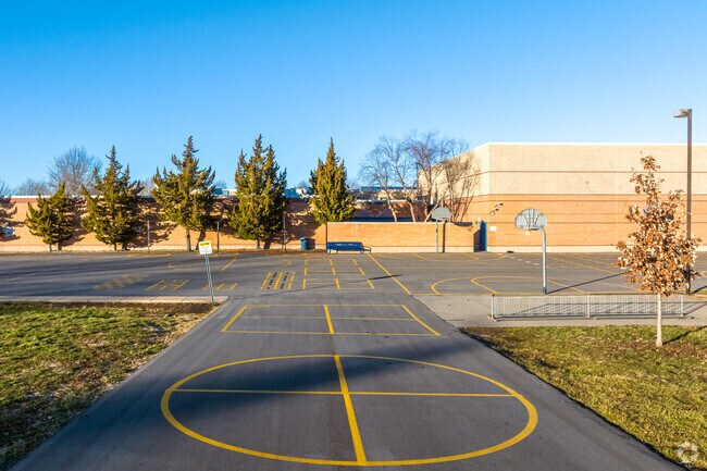 Basketball and other blacktop games are fun at Broken Arrow Elementary School.