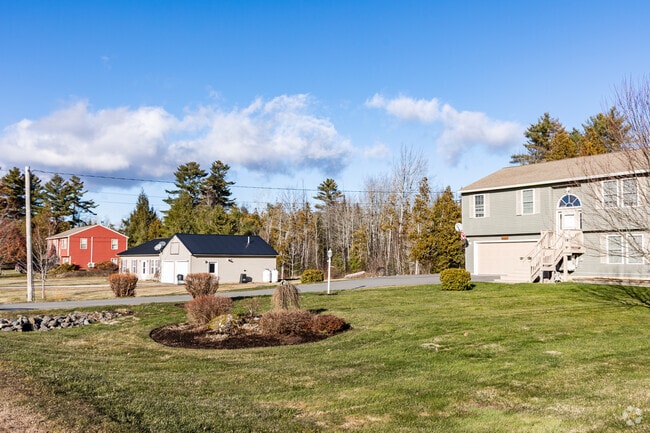 Raised ranch homes with landscaped yards sit on quiet residential streets in Levant.