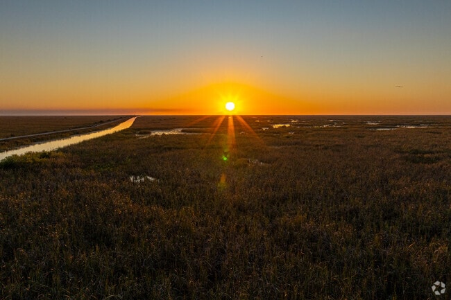 Witness Everglades sunsets from the Sawgrass Trailhead in the City of Coral Springs, FL.