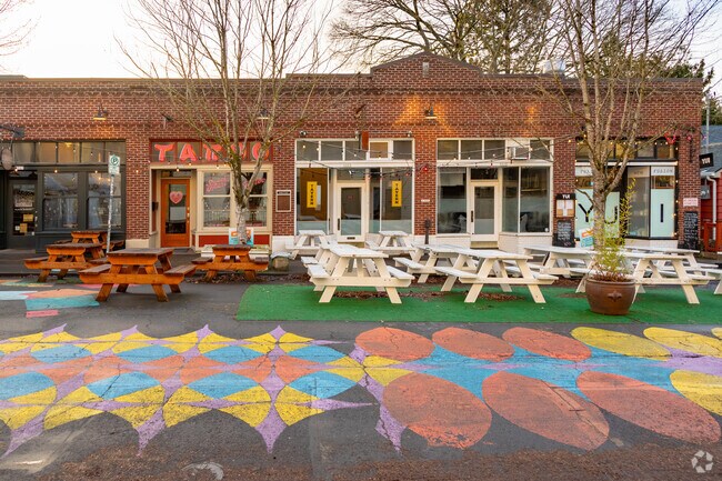 30th and Killingsworth has street seating and chalk-like design on the concrete in Concordia.