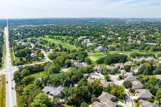 The Ridges is a suburban neighborhood of luxury homes surrounded by mature trees.