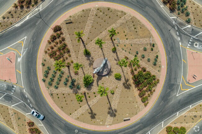 The roundabout into Hideaway is the entrance to the paradise of the neighborhood.