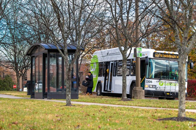 Residents of Beaumont catch a ride in front of Kroger in Beaumont Centre.