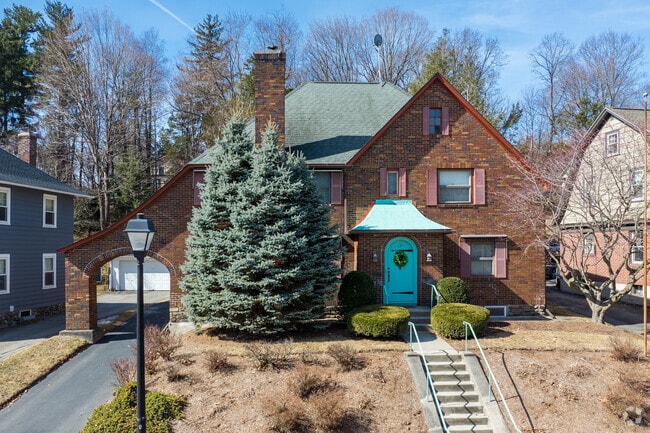 A stunning Victorian home, showcasing classic charm with intricate detailing and timeless elegance in Newton Square.