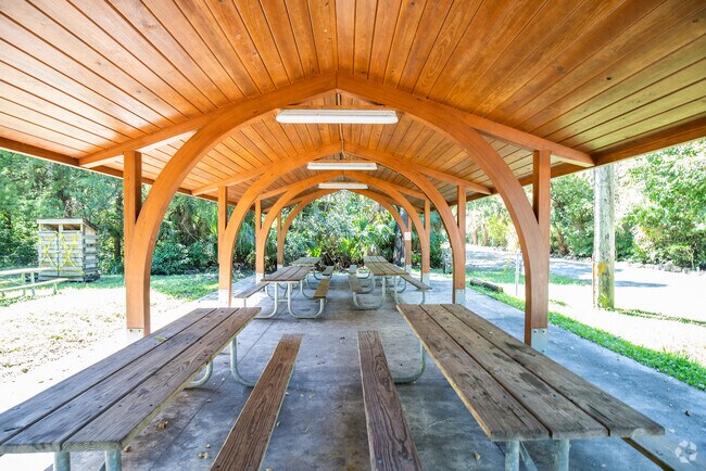 Take a break from walking and have a picnic under the shaded picnic area at Arch Creek Park.