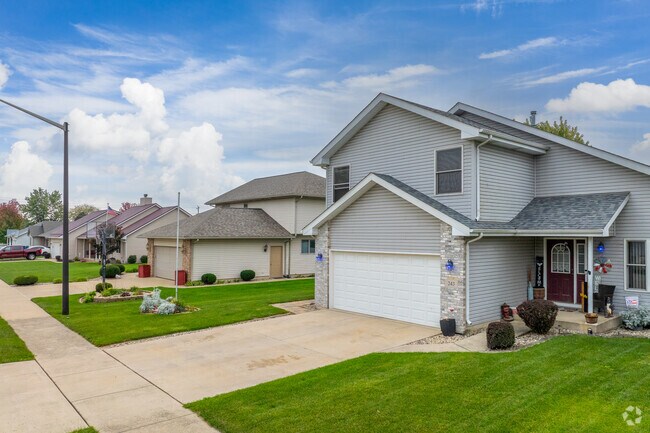 New Traditional homes with large driveways and attached garages are prevalent in Momence.