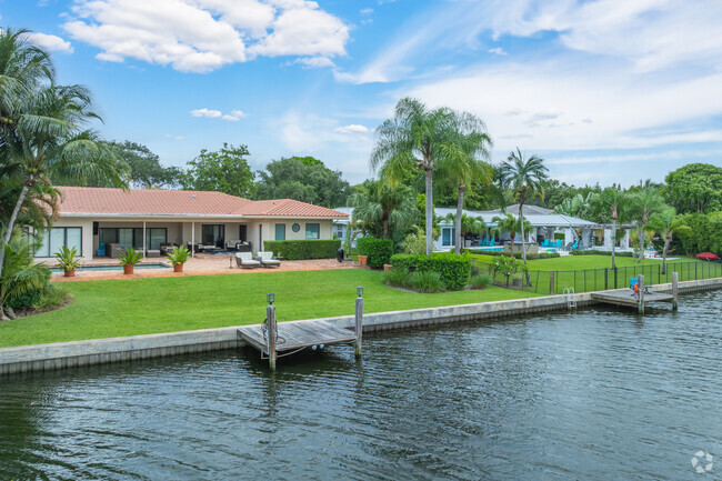 Enjoy serene living in Emerald Hills with homes offering stunning lake views.