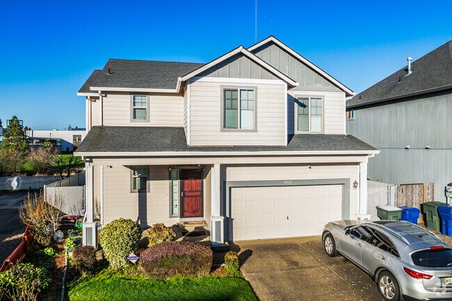 This Craftsman-style home is 2-stories and has a custom front door in East Lancaster.