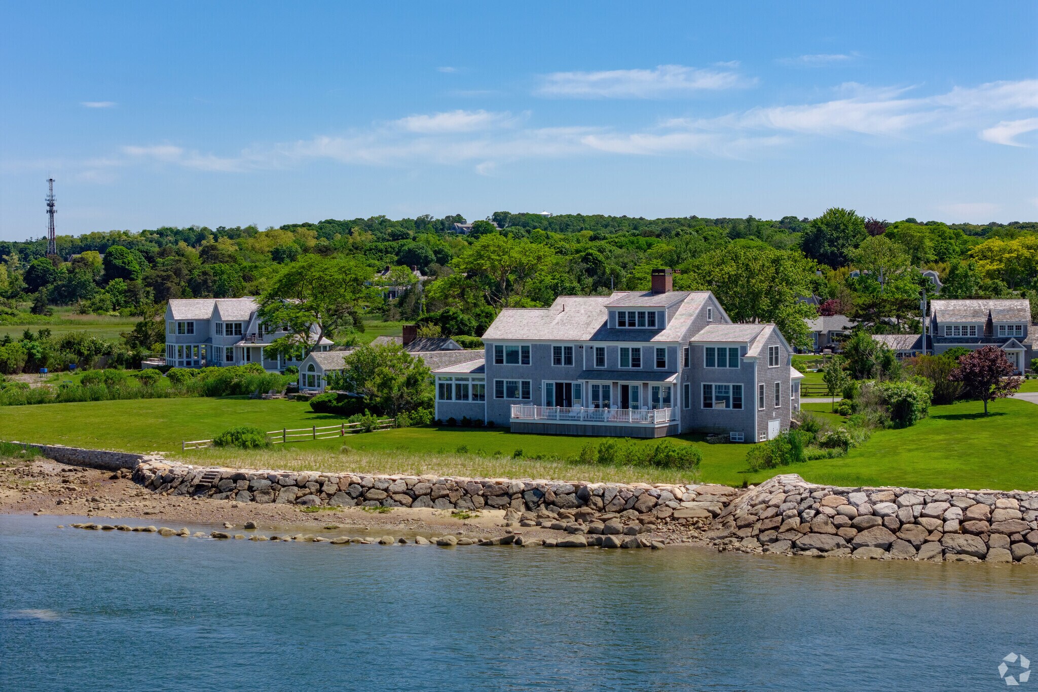 Vast lawns are often part of the rows of waterfront homes in Barnstable Village.
