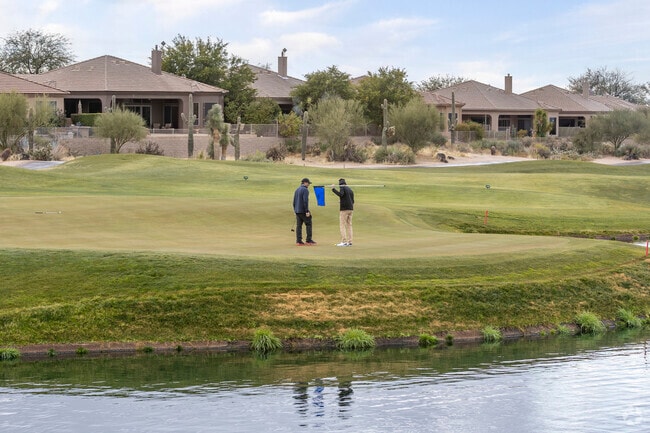 Golfers enjoy a round of golf at Legend Trail Golf Club.