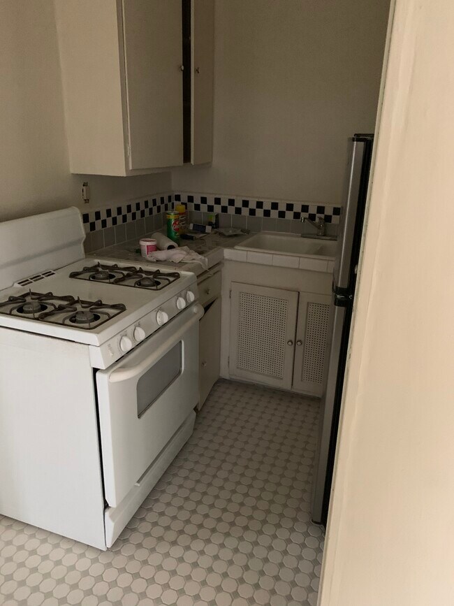 Kitchen With Custom Tile Floors