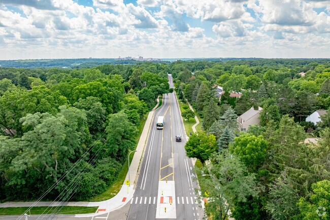 The main road leading to and from Glacier Highlands for cars and pedestrians is Glazier Way.