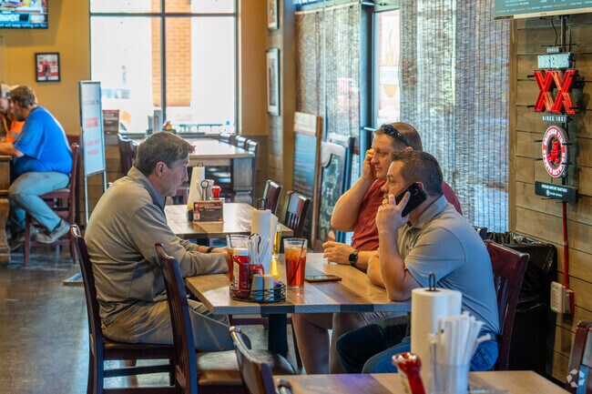 Enjoy time with friends at Overtime Grill and Bar near Jones Valley.