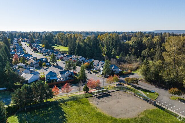 Pioneer Elementary School serves the Arlington, WA community and has a sports field.
