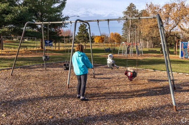 Swings soar and children giggle at Mattson Park in Isanti—a small park with big fun.