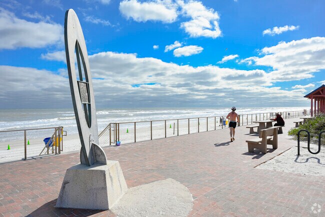 Stroll along the paved pathway at Flagler Avenue Beachfront Park.