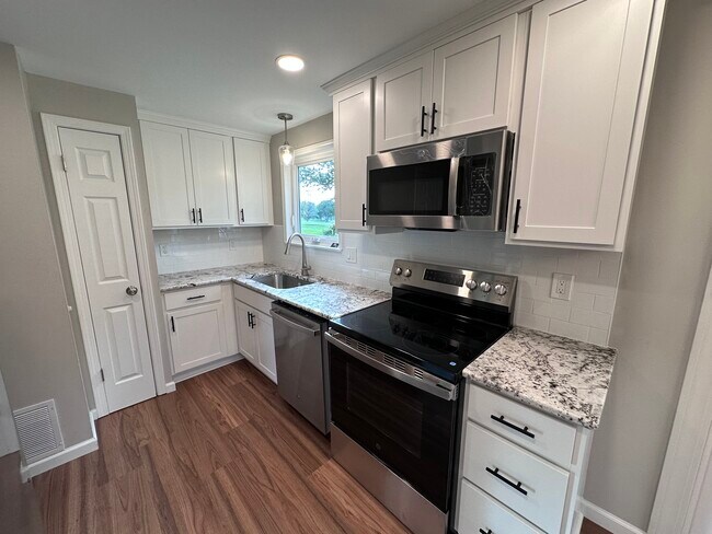 Updated kitchen with granite