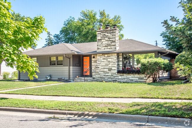 A modest rambler with a bit of flare in the Diamond Lake neighborhood.