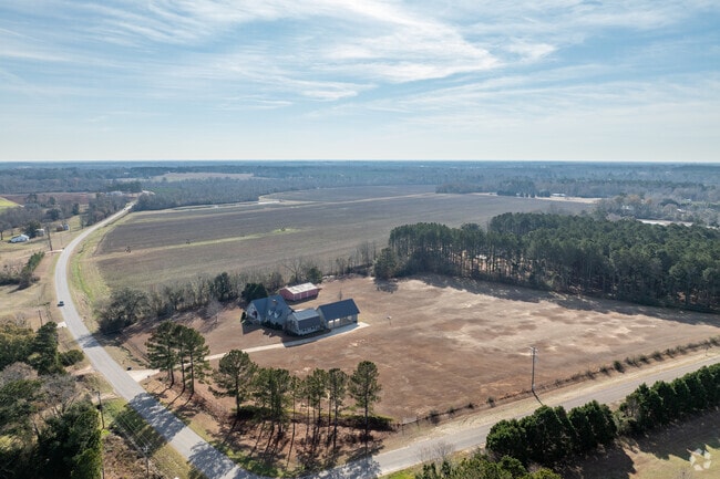 Large, open fields can be found along the country roads of Dothan.