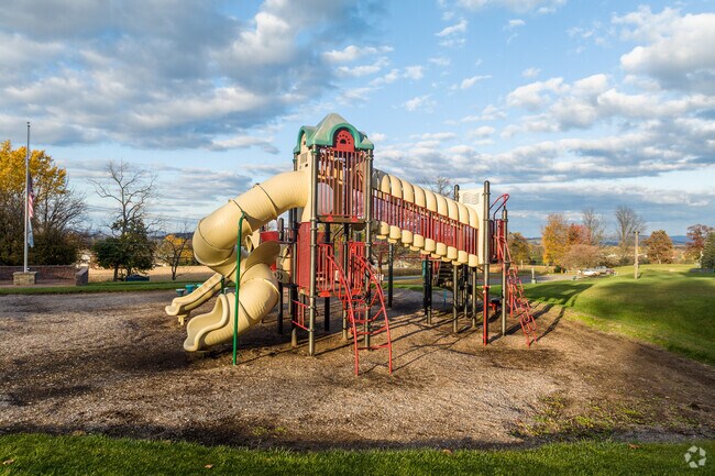 Local kids and parents enjoy the playground at the Heidelberg Run West Recreation Area.