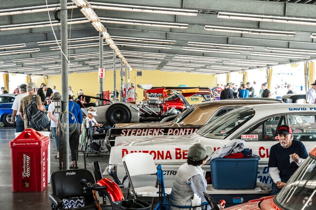 View classic cars and muscle cars at the Daytona International Speedway in Pelican Bay.