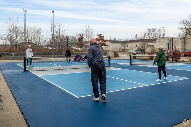 Play a round of pickleball at Switchyard Park near Prospect Hill.