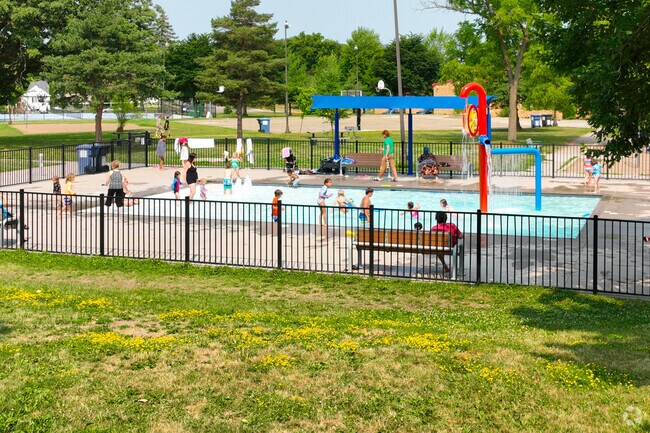 Kids and parents enjoying the community pool at Waite Park.