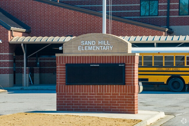Sand Hill Elementary School receives an A- from Niche and 5 from GreatSchools.