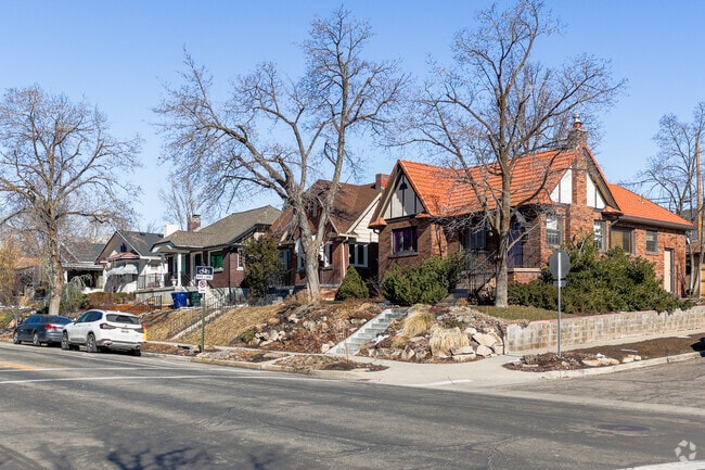 One-story Tudor-style homes in Wasatch Hollow.