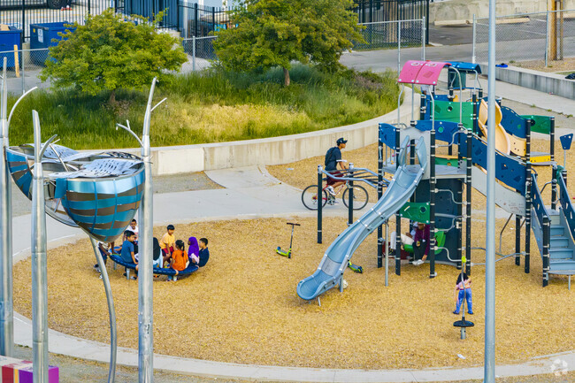New Freedom Park on a summer evening where lots of kids play.