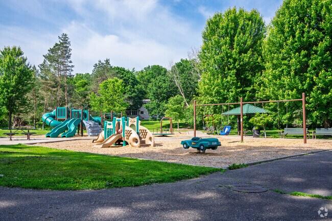 Discover the neighborhood's kids' playground, soccer, and tennis at Spring Hill Park.