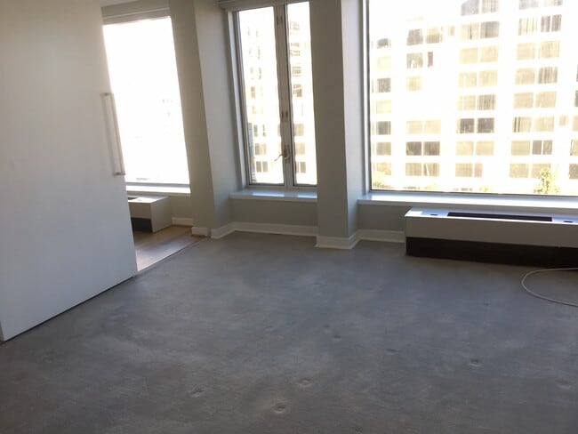 Bedroom with large windows