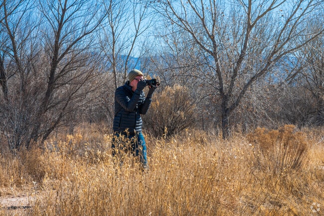 A photographer enjoying the wildlife at Whitfield Wildlife Conservation Area.