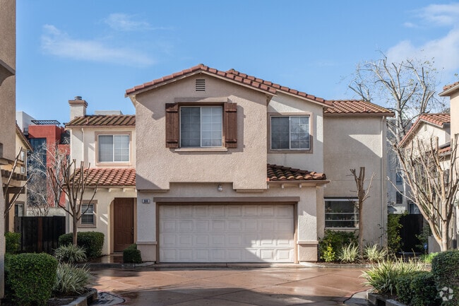 Modern Spanish Revival style homes are prominent in the Santana Row area.