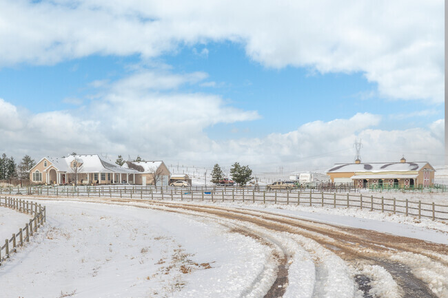 Many homes in HR Ranch feature large garages and horse stables