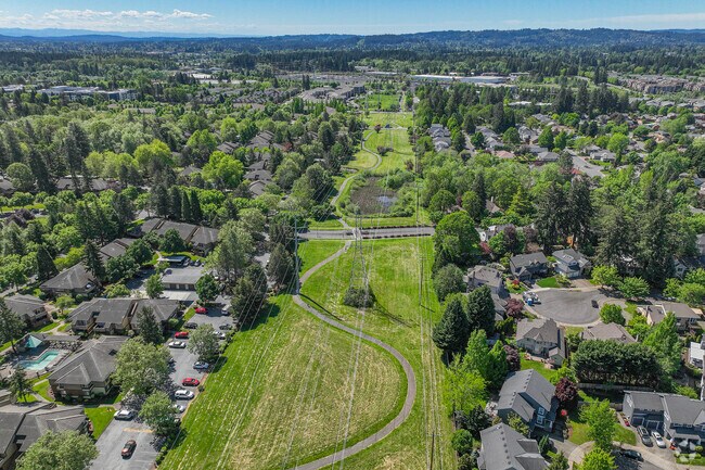 The Beautiful Five Oaks neighborhood surrounds the Waterhouse Powerline Park.