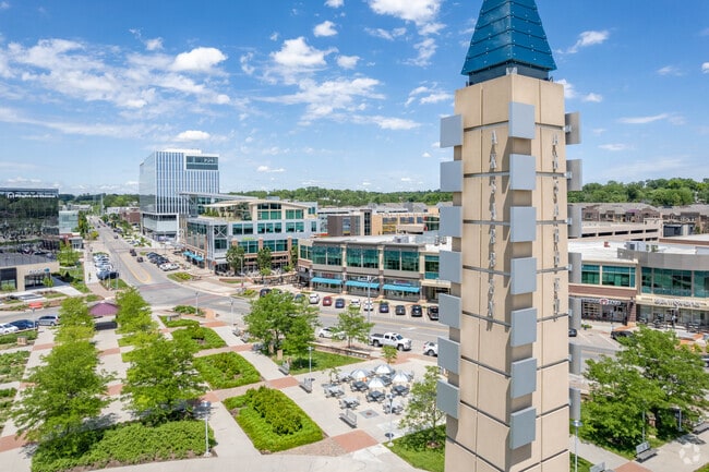 Aksarben Village Tower, in Stinson Park, overlooks retail and dining in the area.